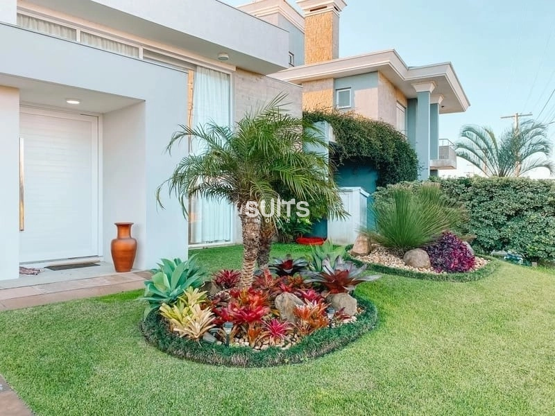 Excelente casa com uma linda área verde no Condomínio Rivieira: 1ª foto da galeria de imagens do imóvel