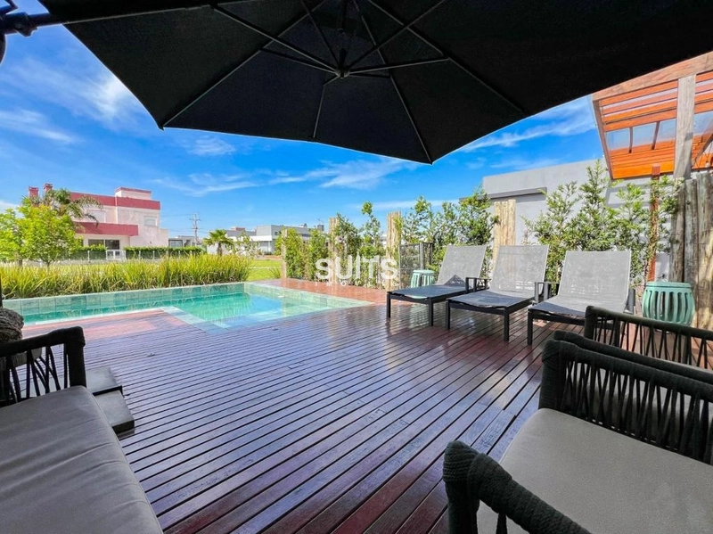 Excelente casa com fundos para área verde no condomínio Riviera: 22ª foto da galeria de imagens do imóvel