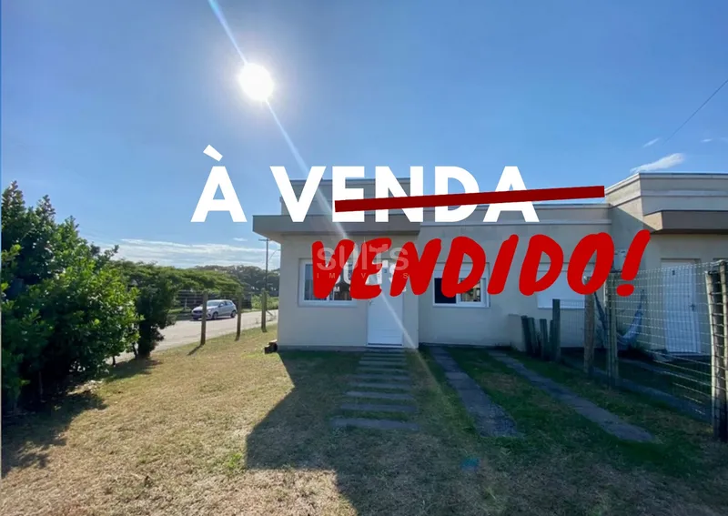 Linda casa geminada à venda na praia de Remanso em Xangri-Lá.: 1ª foto da galeria de imagens do imóvel