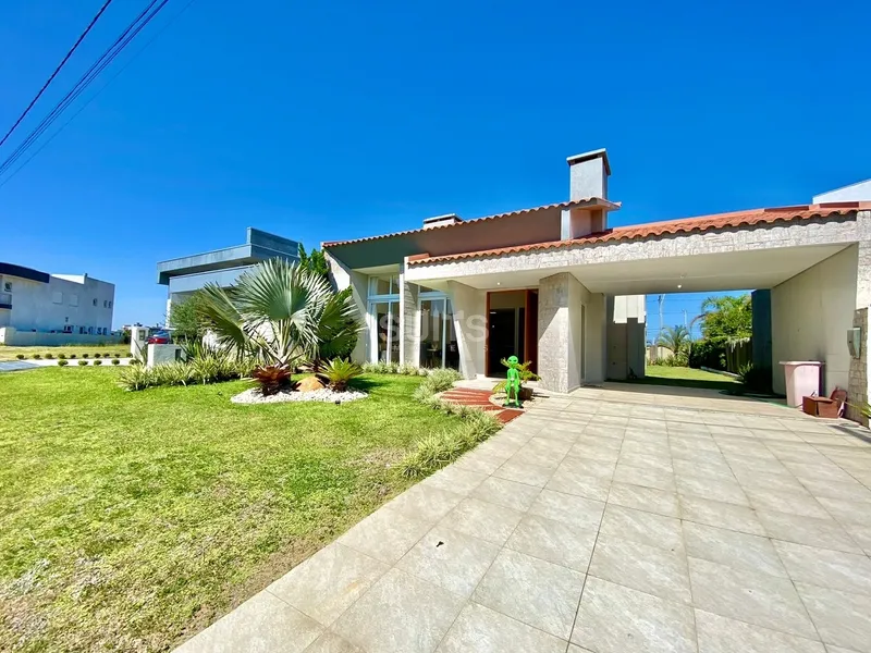 Excelente casa no Condomínio Riviera em Xangri-Lá: 2ª foto da galeria de imagens do imóvel