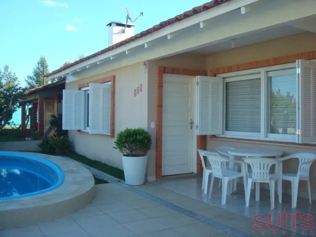 Excelente casa com piscina na praia Noiva do Mar em Xangri-Lá: 1ª foto da galeria de imagens do imóvel
