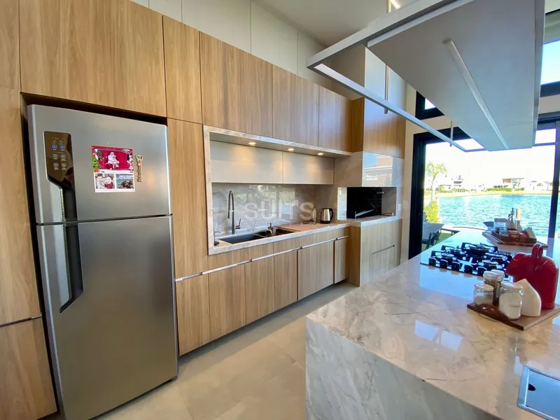 Excelente casa térrea na beira do lago no condomínio Riviera: 14ª foto da galeria de imagens do imóvel