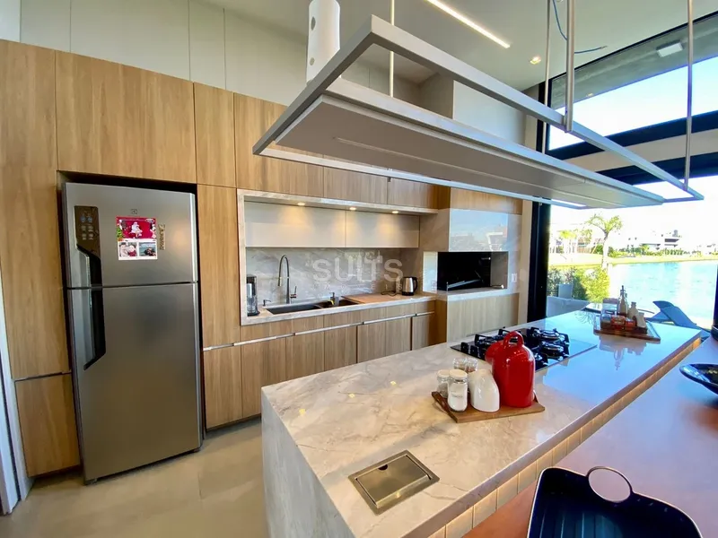 Excelente casa térrea na beira do lago no condomínio Riviera: 11ª foto da galeria de imagens do imóvel