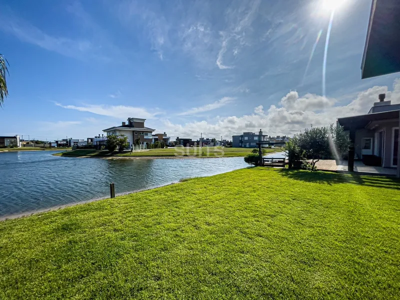 Excelente casa térrea na beira do lago no condomínio Riviera: 19ª foto da galeria de imagens do imóvel