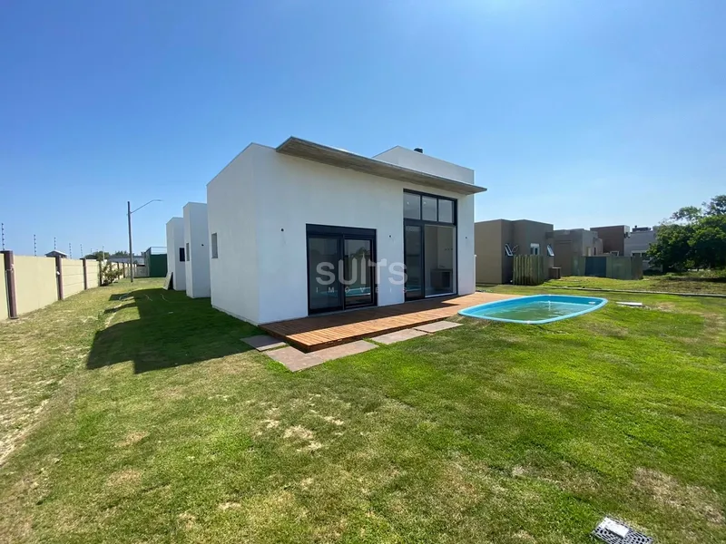 Linda casa em construção à venda no condomínio Riviera: 6ª foto da galeria de imagens do imóvel