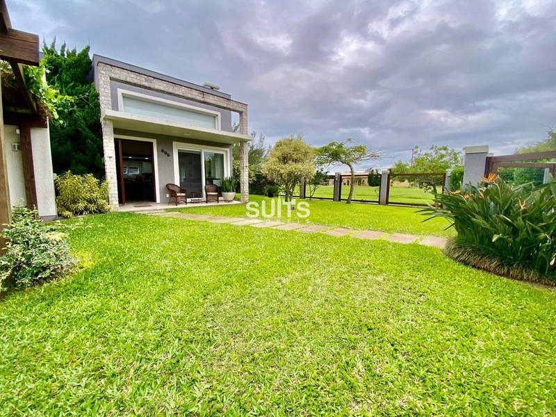 Belíssima casa em excelente localização na praia de Atlântida: 3ª foto da galeria de imagens do imóvel