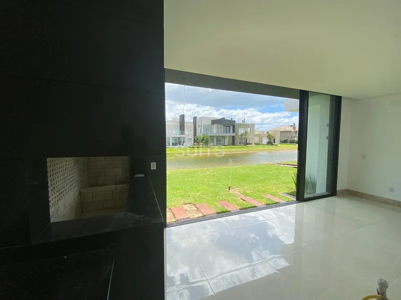 Excelente casa beira lago no condomínio Riviera: 7ª foto da galeria de imagens do imóvel