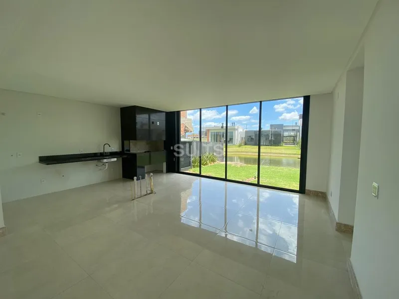 Excelente casa beira lago no condomínio Riviera: 8ª foto da galeria de imagens do imóvel