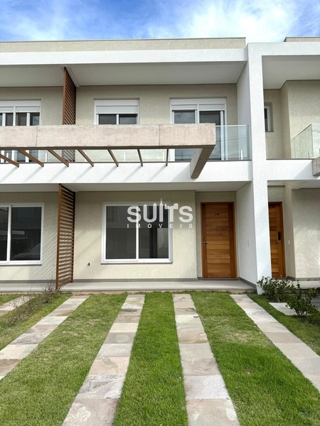 Excelente sobrado à venda no condomínio Murano em Capão da Canoa: 1ª foto da galeria de imagens do imóvel