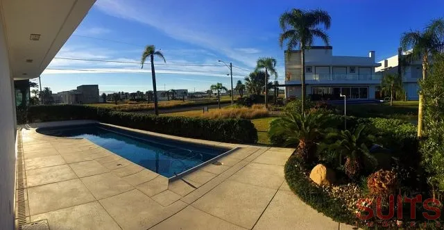 Sobrado espetacular no Condomínio Enseada: 30ª foto da galeria de imagens do imóvel