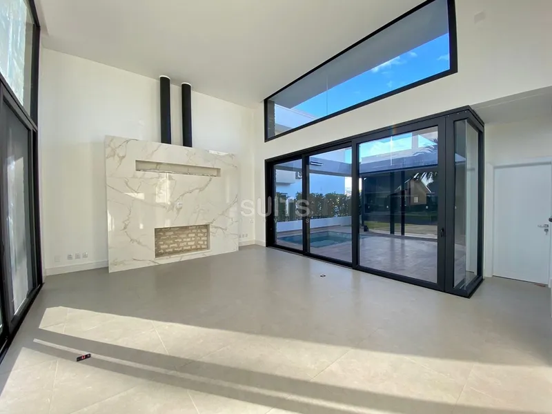 Belíssima casa em construção no condomínio Villaggio Atlântida: 3ª foto da galeria de imagens do imóvel