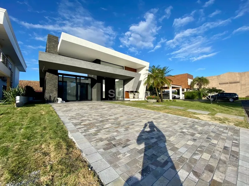 Belíssima casa em construção no condomínio Villaggio Atlântida: 1ª foto da galeria de imagens do imóvel