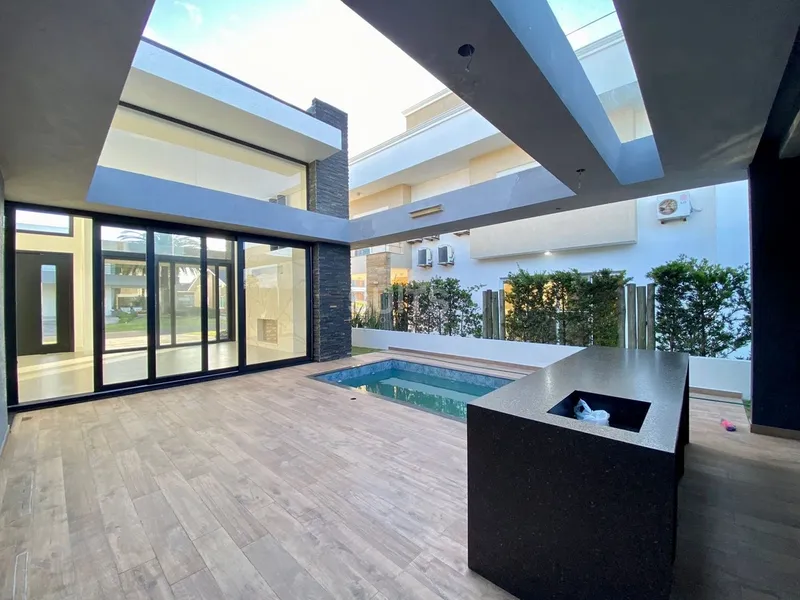 Belíssima casa em construção no condomínio Villaggio Atlântida: 11ª foto da galeria de imagens do imóvel