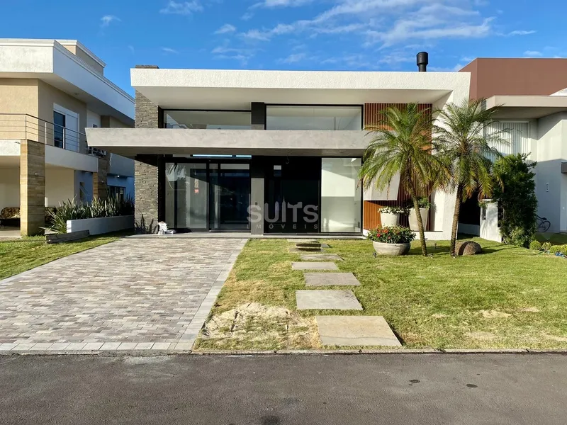 Belíssima casa em construção no condomínio Villaggio Atlântida: 2ª foto da galeria de imagens do imóvel