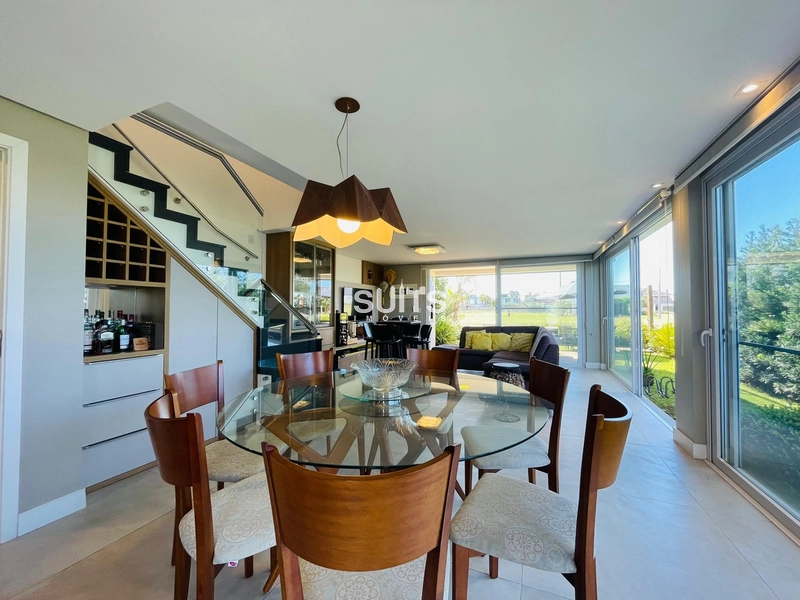 Excelente casa à venda no condomínio One em Atlântida: 3ª foto da galeria de imagens do imóvel