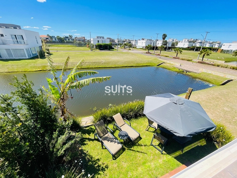 Excelente casa à venda no condomínio One em Atlântida: 49ª foto da galeria de imagens do imóvel