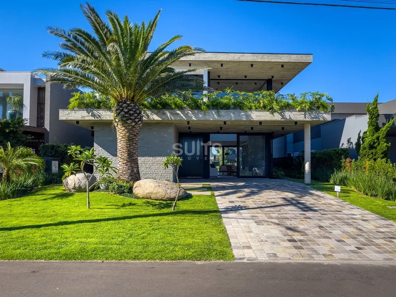 Excelente sobrado beira lago no condomínio Villaggio em Atlântida: 3ª foto da galeria de imagens do imóvel