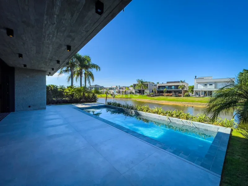 Excelente sobrado beira lago no condomínio Villaggio em Atlântida: 21ª foto da galeria de imagens do imóvel