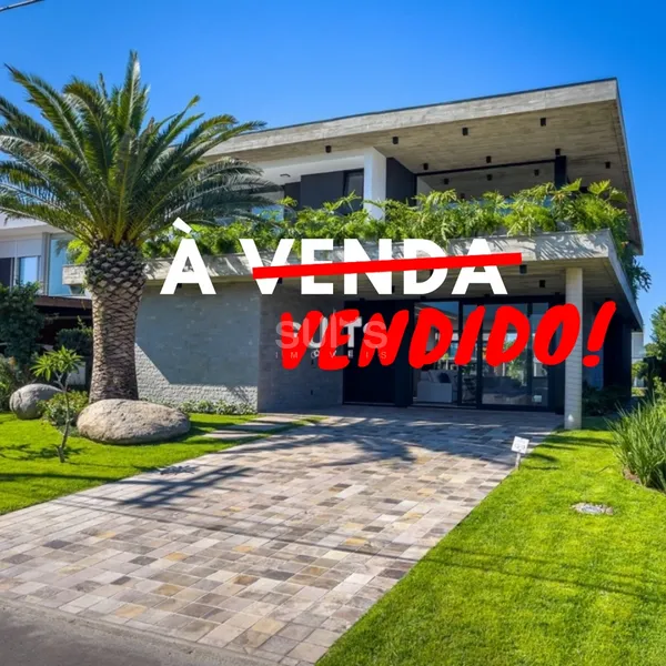 Excelente sobrado beira lago no condomínio Villaggio em Atlântida: 1ª foto da galeria de imagens do imóvel