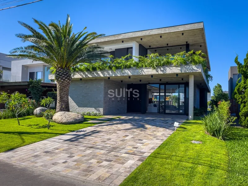 Excelente sobrado beira lago no condomínio Villaggio em Atlântida: 2ª foto da galeria de imagens do imóvel