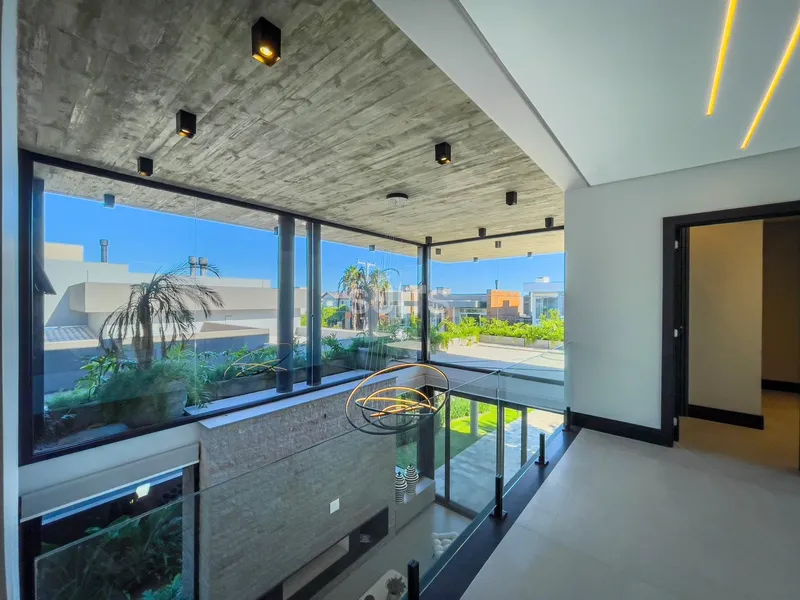 Excelente sobrado beira lago no condomínio Villaggio em Atlântida: 27ª foto da galeria de imagens do imóvel