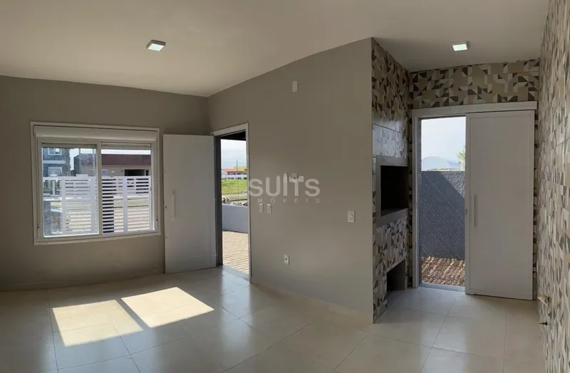 Casa nova na praia de Atlântida Sul: 1ª foto da galeria de imagens do imóvel