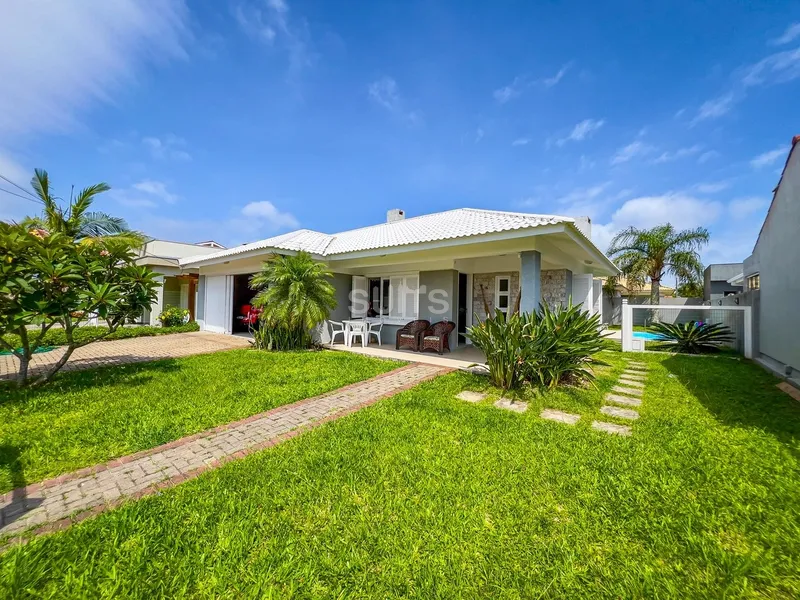 Excelente casa muito bem localizada na praia de Atlântida: 2ª foto da galeria de imagens do imóvel