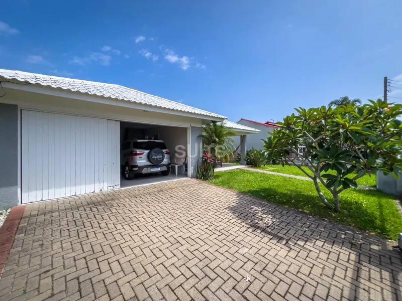 Excelente casa muito bem localizada na praia de Atlântida: 3ª foto da galeria de imagens do imóvel