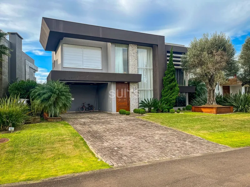 Excelente sobrado beira lago no Condomínio Enseada: 2ª foto da galeria de imagens do imóvel