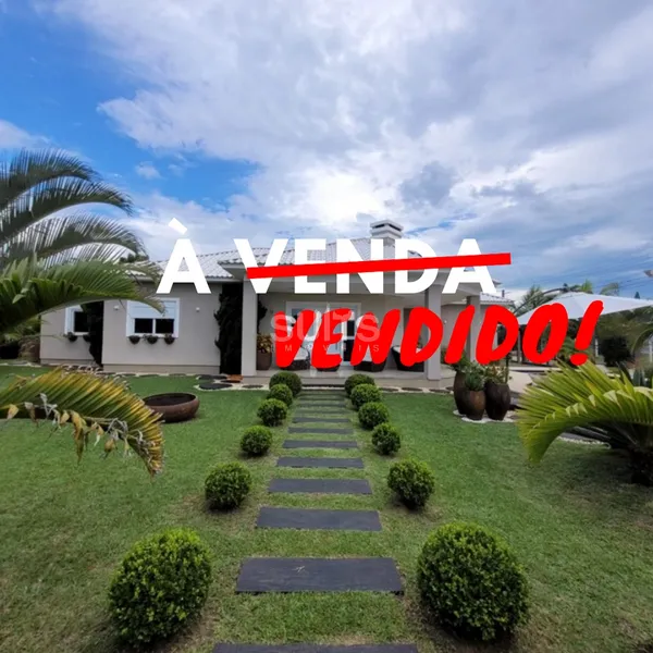 Excelente casa de esquina na praia de Atlântida: 1ª foto da galeria de imagens do imóvel