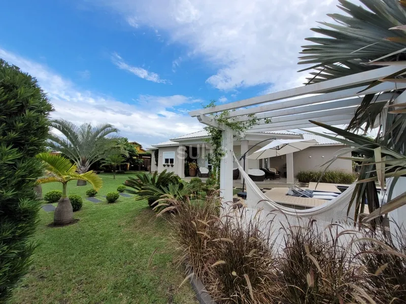 Excelente casa de esquina na praia de Atlântida: 4ª foto da galeria de imagens do imóvel