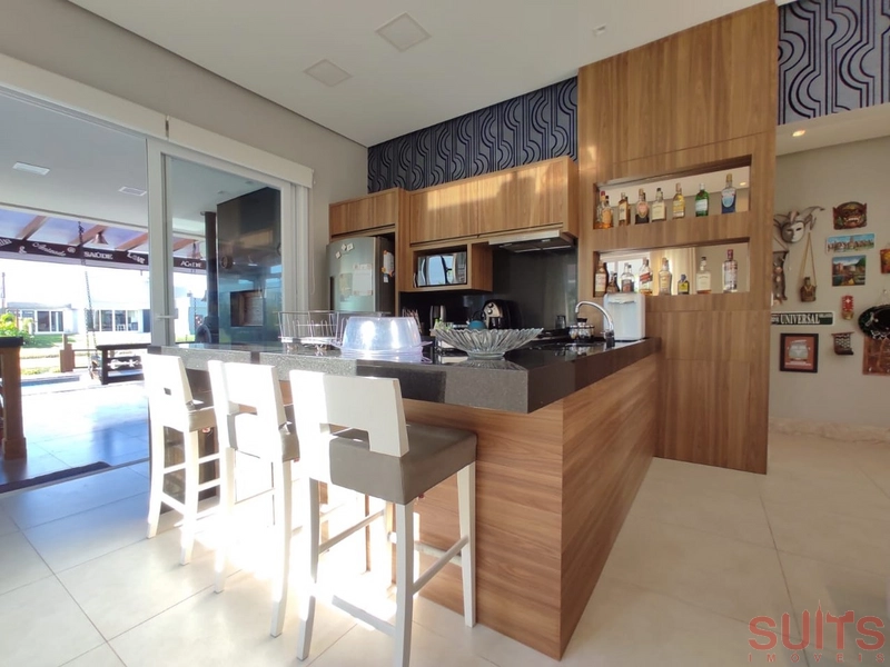 Linda casa beira lago com piscina no Condomínio Riviera: 14ª foto da galeria de imagens do imóvel