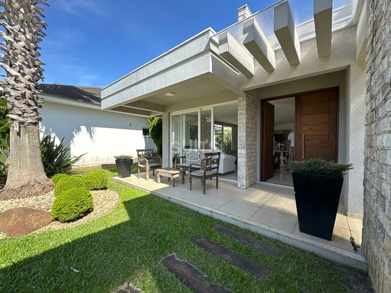 Linda casa fundos área verde no Condomínio Ventura em Xangri-Lá: 1ª foto da galeria de imagens do imóvel