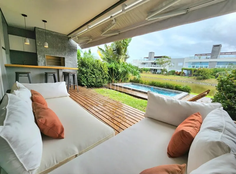 Belíssimo giardino com piscina no condomínio Rossi de Atlântida: 11ª foto da galeria de imagens do imóvel