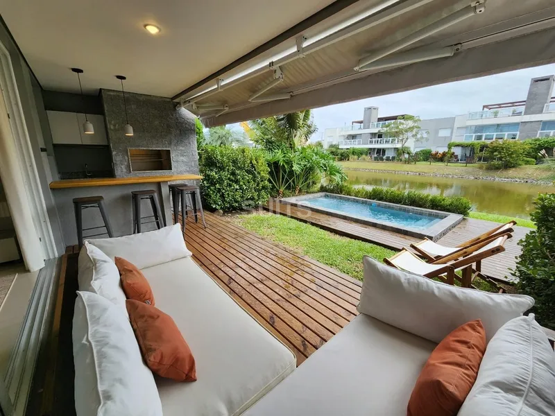 Belíssimo giardino com piscina no condomínio Rossi de Atlântida: 7ª foto da galeria de imagens do imóvel