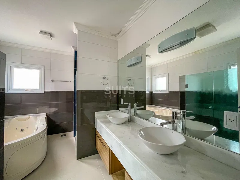 Belo sobrado no condomínio Bosques de Atlântida: 31ª foto da galeria de imagens do imóvel