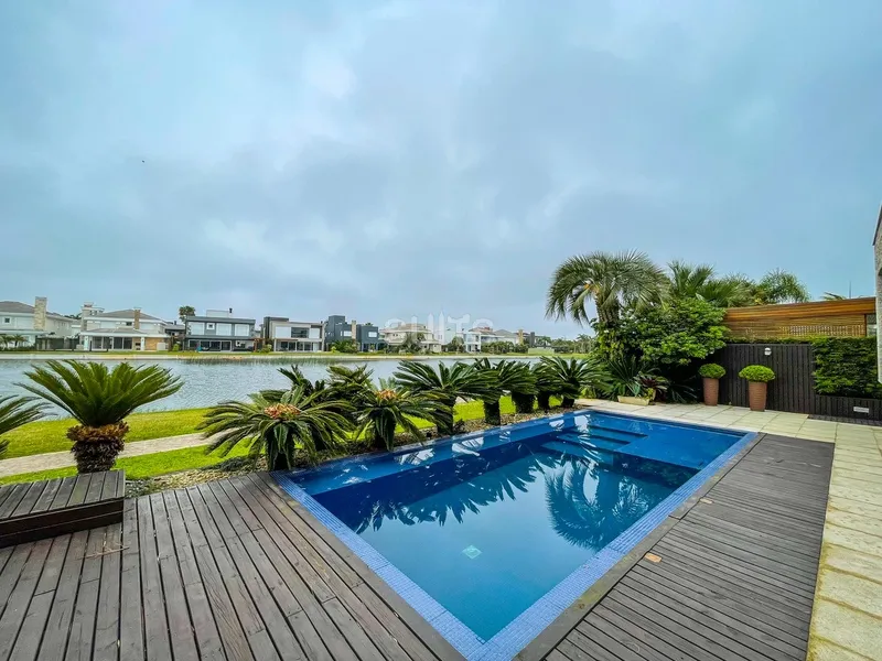 Belo sobrado no condomínio Bosques de Atlântida: 38ª foto da galeria de imagens do imóvel