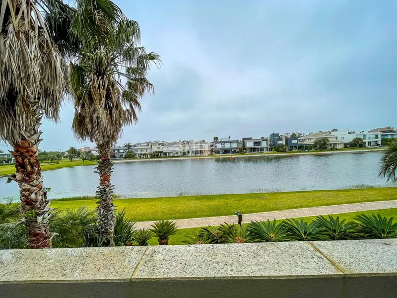 Belo sobrado no condomínio Bosques de Atlântida: 25ª foto da galeria de imagens do imóvel