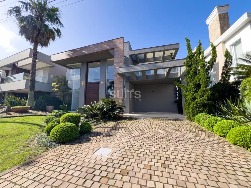 Excelente Sobrado no Condomínio Bosques de Atlântida: 3ª foto da galeria de imagens do imóvel