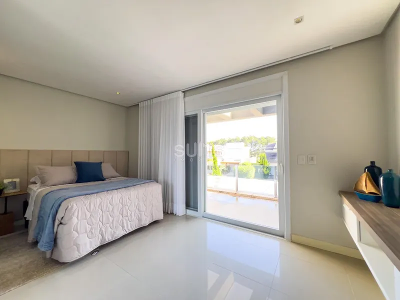 Excelente Sobrado no Condomínio Bosques de Atlântida: 42ª foto da galeria de imagens do imóvel