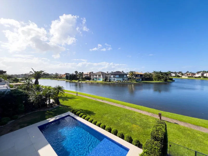 Excelente Sobrado no Condomínio Bosques de Atlântida: 47ª foto da galeria de imagens do imóvel