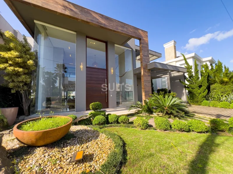 Excelente Sobrado no Condomínio Bosques de Atlântida: 2ª foto da galeria de imagens do imóvel