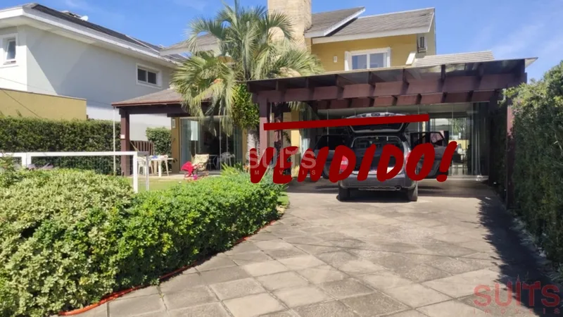 Lindo sobrado à venda no condomínio Lagos Park em Atlântida: 1ª foto da galeria de imagens do imóvel