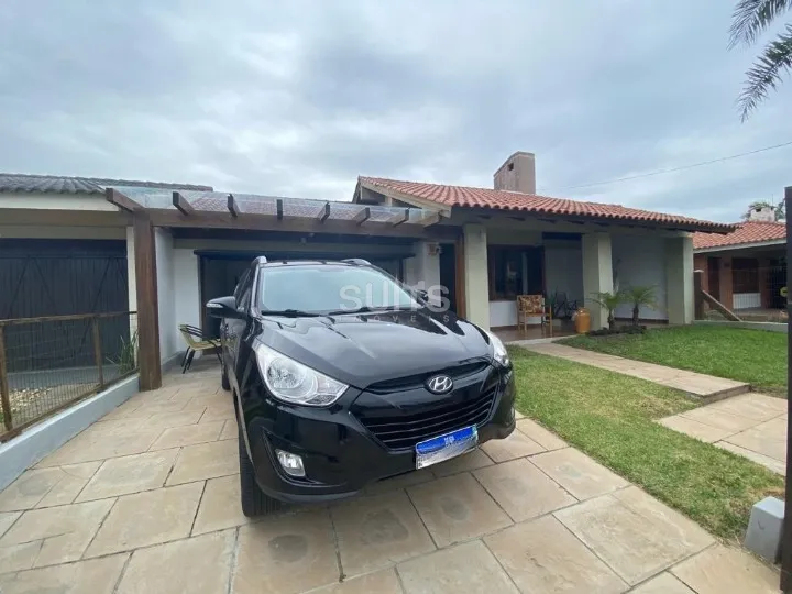 Excelente casa à venda próxima do mar no Centro de Xangri-Lá: 2ª foto da galeria de imagens do imóvel