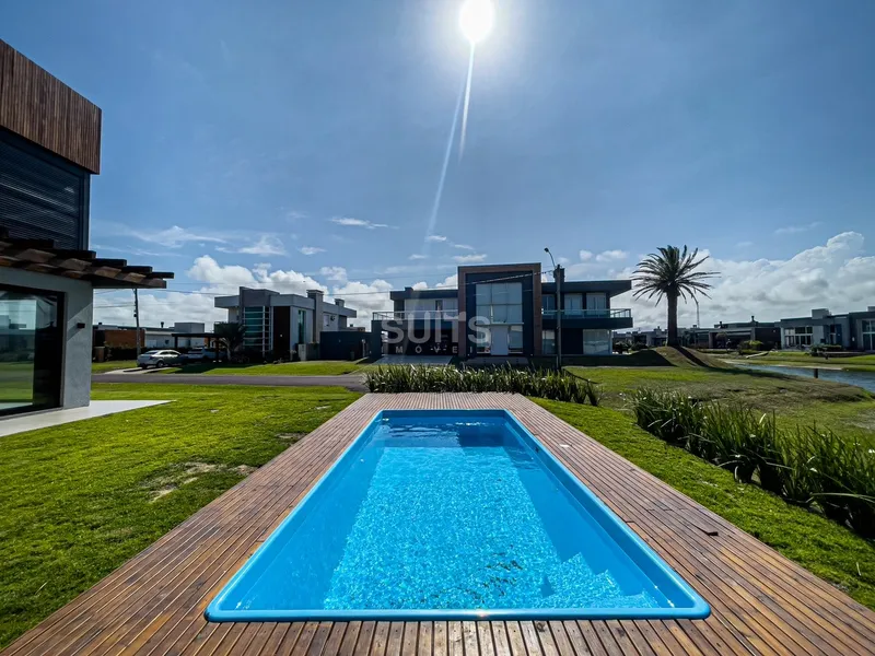 Belo sobrado de esquina no condomínio Rivieira: 17ª foto da galeria de imagens do imóvel