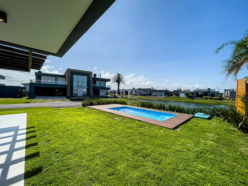 Belo sobrado de esquina no condomínio Rivieira: 16ª foto da galeria de imagens do imóvel