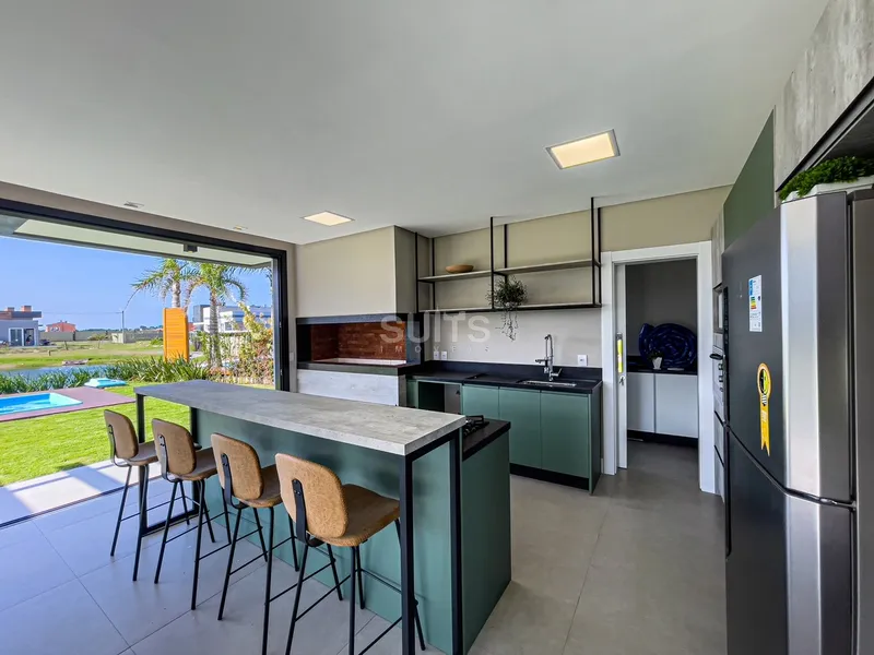 Belo sobrado de esquina no condomínio Rivieira: 11ª foto da galeria de imagens do imóvel