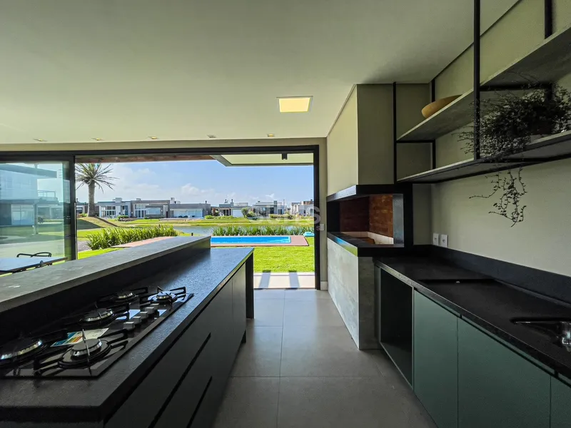 Belo sobrado de esquina no condomínio Rivieira: 15ª foto da galeria de imagens do imóvel