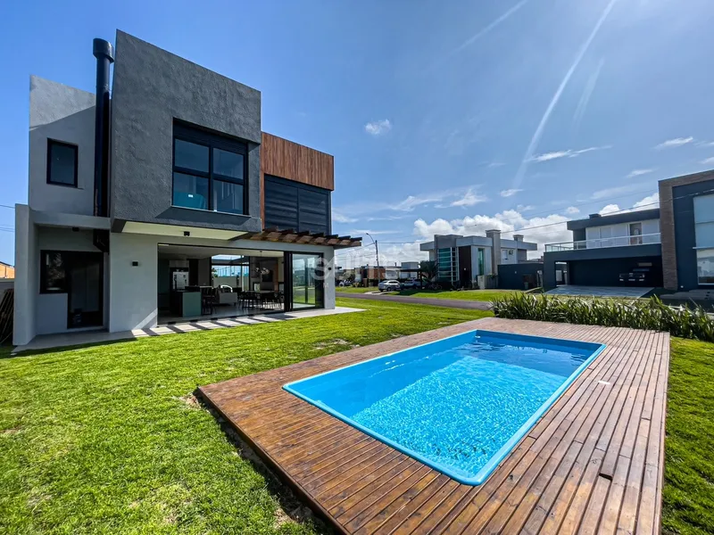 Belo sobrado de esquina no condomínio Rivieira: 18ª foto da galeria de imagens do imóvel