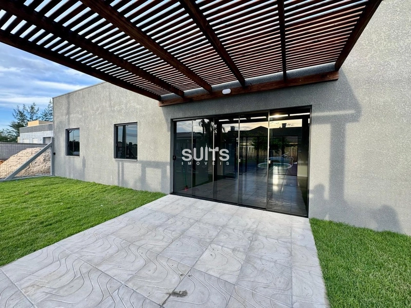 Casa térrea mobiliada, bem localizada em Atlântida Sul.: 2ª foto da galeria de imagens do imóvel